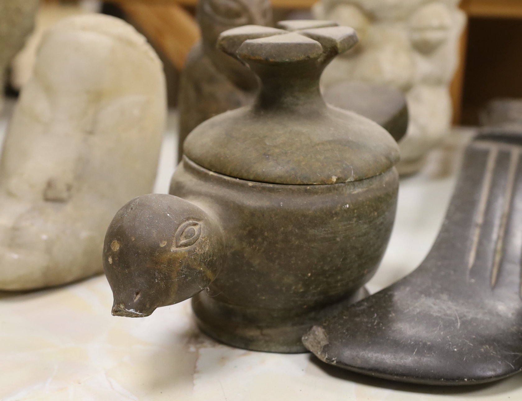 Eight Shona stone carvings, 1960s-1970s, including figures, heads and abstract sculpture forms, tallest 31cm